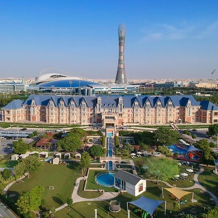 Al Aziziyah Boutique Hotel By The Torch Doha Exterior foto Aerial view of the Al-Shaab Olympic Village